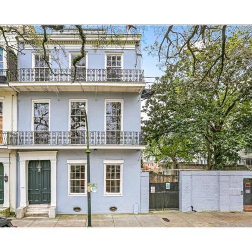 Greek Revival mansion built in 1836 for Madam Celeste Destrahan  [Destrahan Plantation]. The Sale includes addresses 908 and 910 Esplanade Ave. which are combined addresses for the structures.