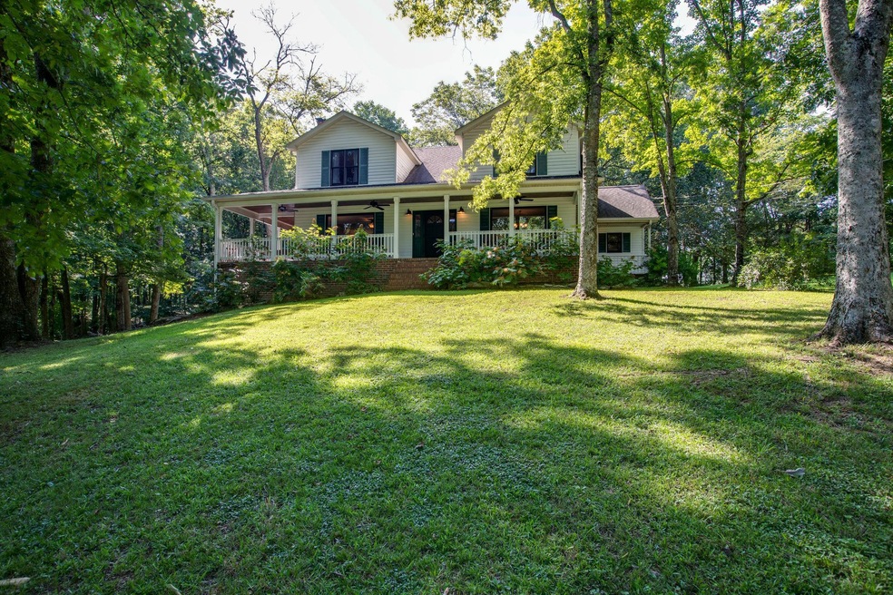 This picturesque property is located on 5 beautiful acres. Absolutely TN living at its finest with the convenience of a grocery & shopping all within 10 min.