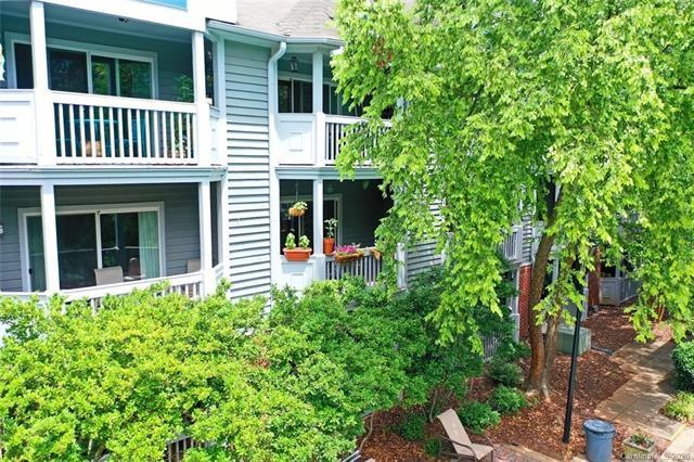 2nd Floor Living - Covered Porch with Flowers is t