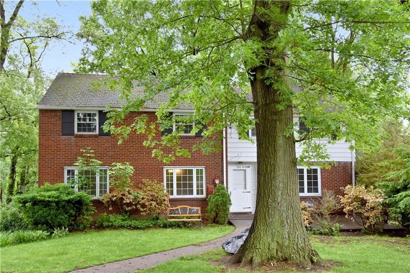 Welcome to 200 Glenfield Drive!  This stately bric