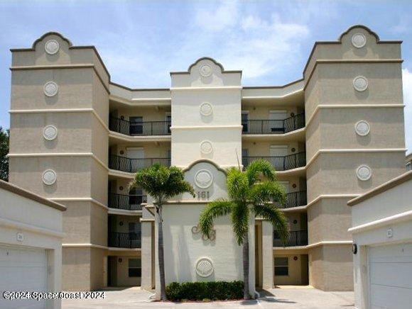 161 Majestic Bay Ave unit 203, Cape Canaveral, FL 32920 - photo 1