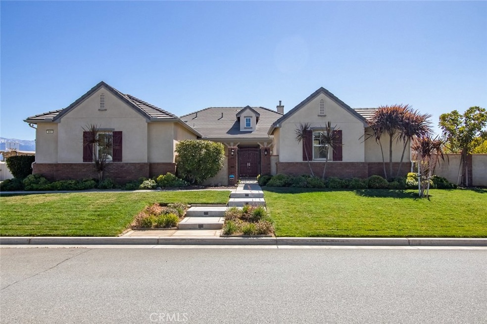Single story home with separate Casita on the right.