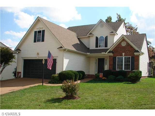 Exterior Front - Low maintenance -- no grass cutti