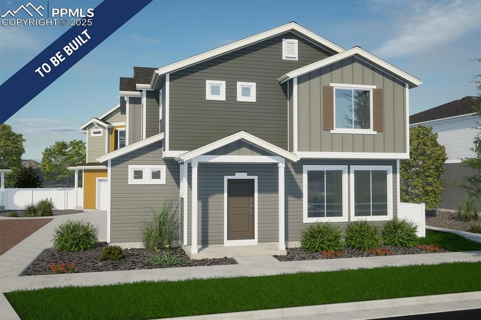 View of front of property with fence and board and
