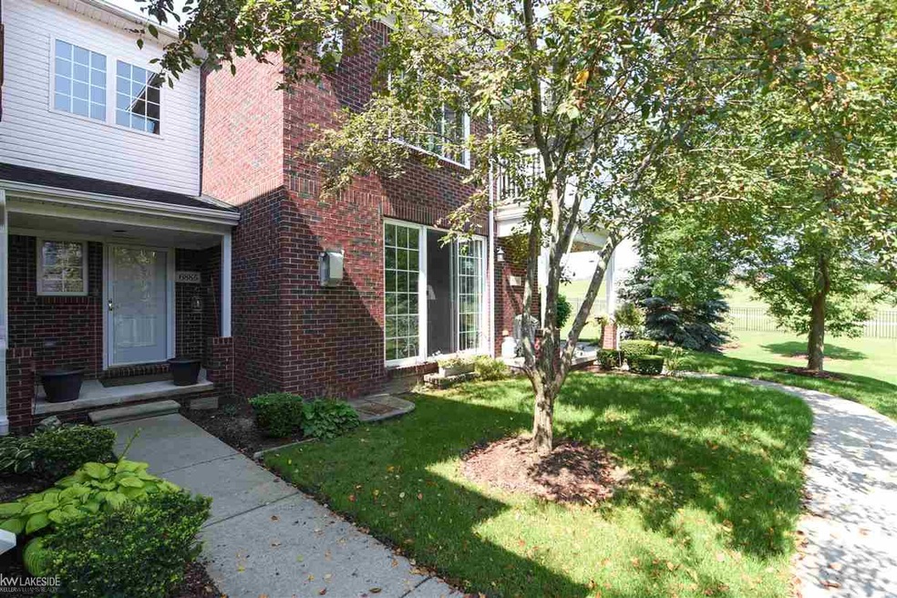 6881 Boulder Pointe Dr unit 46, Washington, MI 48094 - photo 1