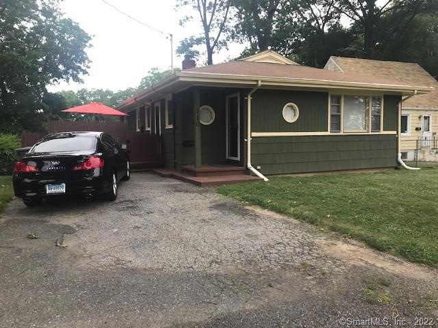 Front of house with driveway