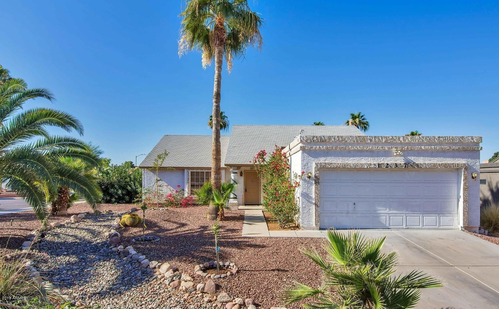 1237 E Kristal Way-large-001-2-Front Ext