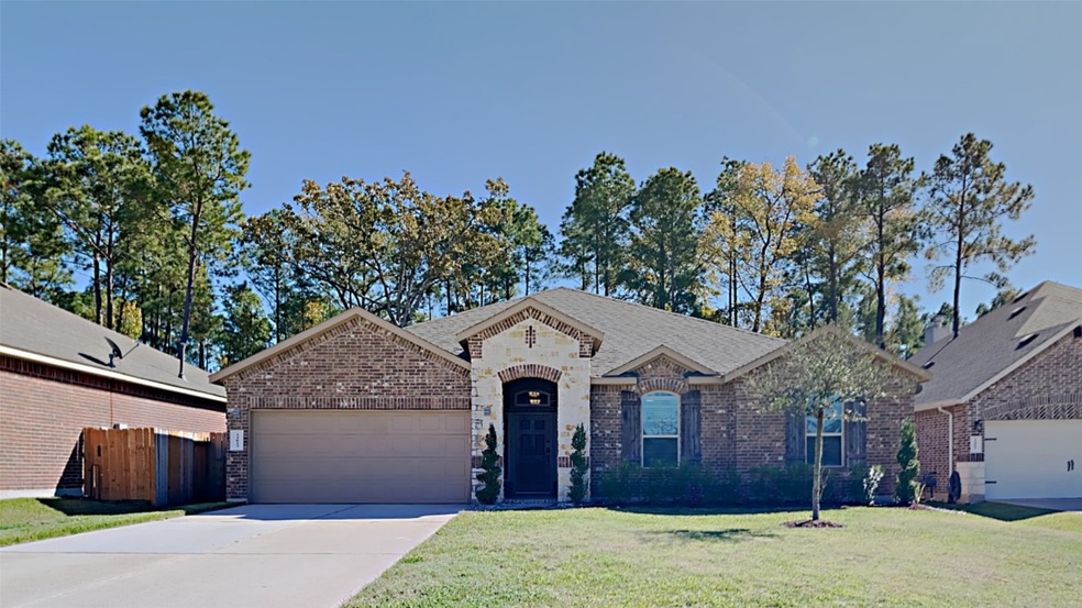14023 Beaverhead Range Ct, Conroe, TX 77384 - photo 1