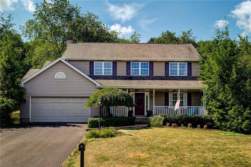 Welcome to 703 Russett Meadow Court. Everything you'd want -- attached garage, welcoming front porch, tiered backyard that's wooded, end of culdesac, and walk to the park & playground!