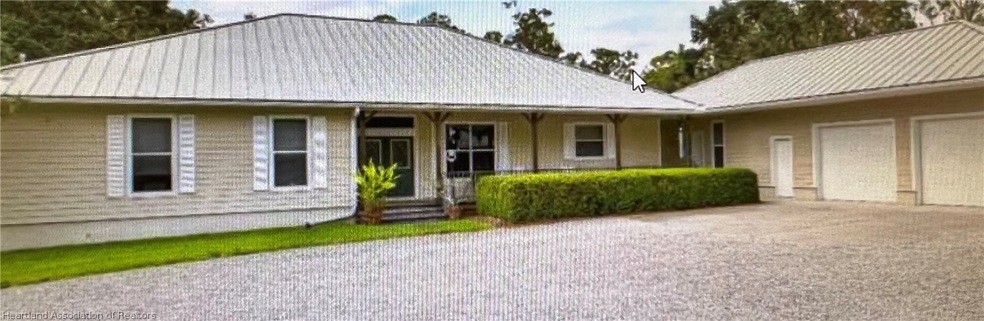 327 Holmes Ave, Lake Placid, FL 33852 - photo 1