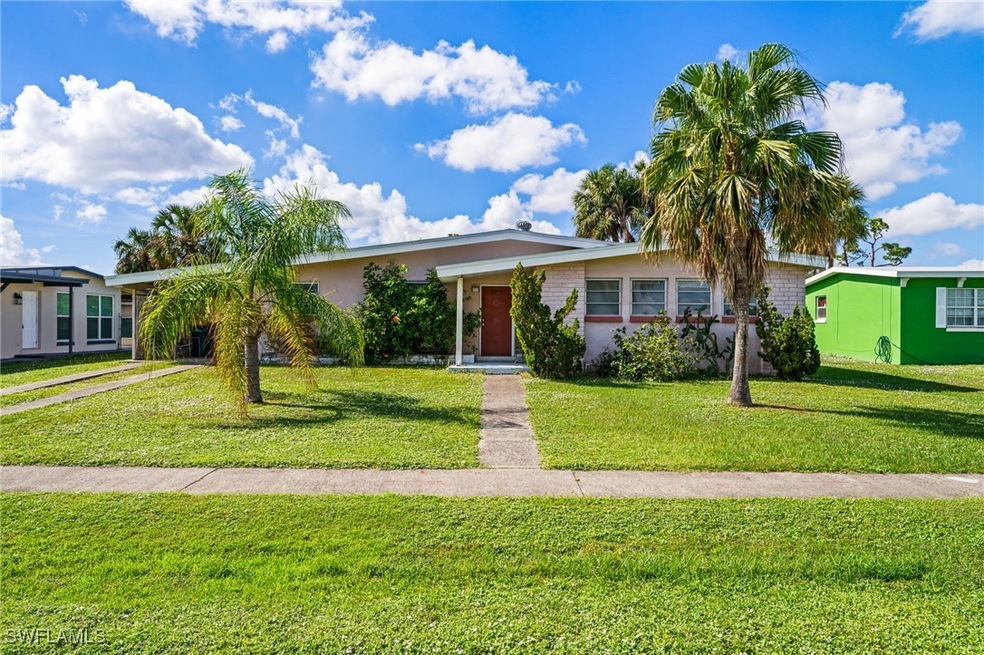 Ranch-style house featuring a front yard
