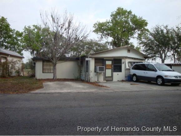 9277 Grizzly Bear Ln, Weeki Wachee, FL 34613 - photo 1