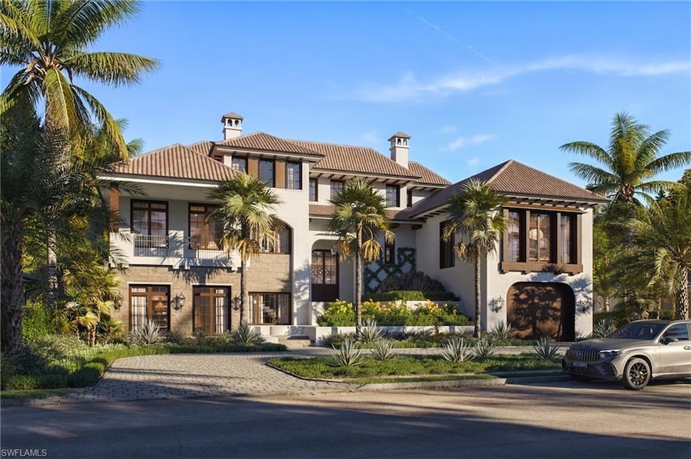 Mediterranean / spanish-style house featuring a ti
