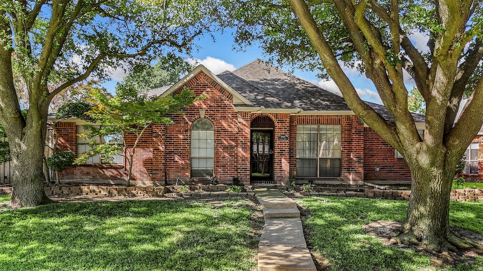 Welcome home to 6905 Rochelle Drive in Plano!