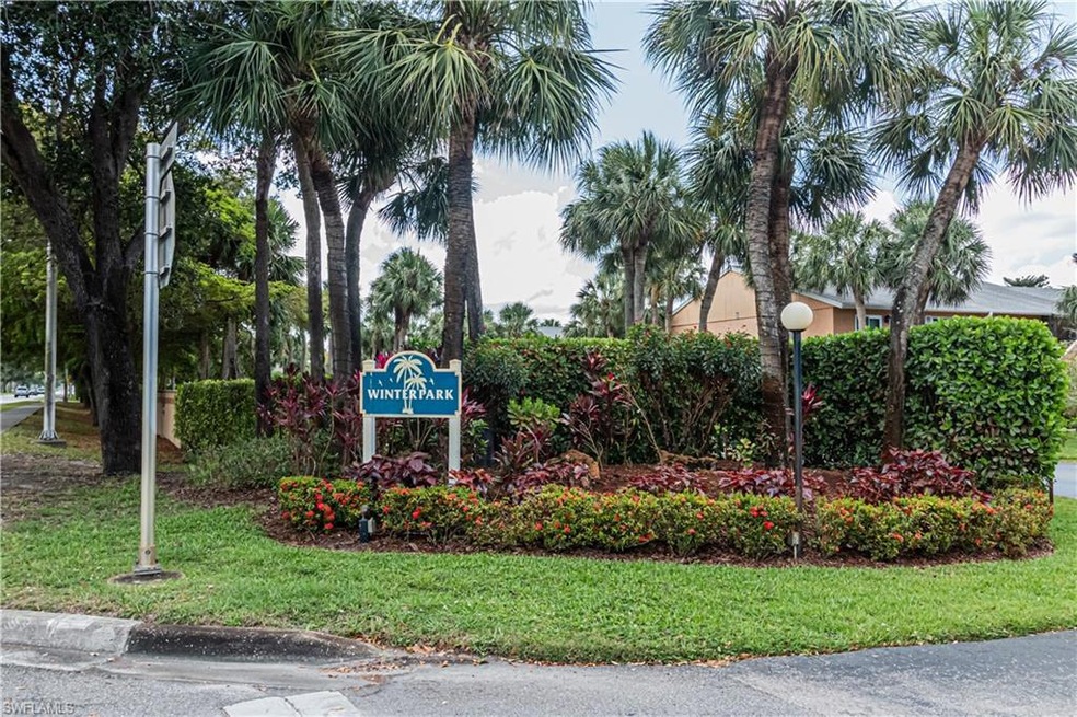 Community sign with a lawn