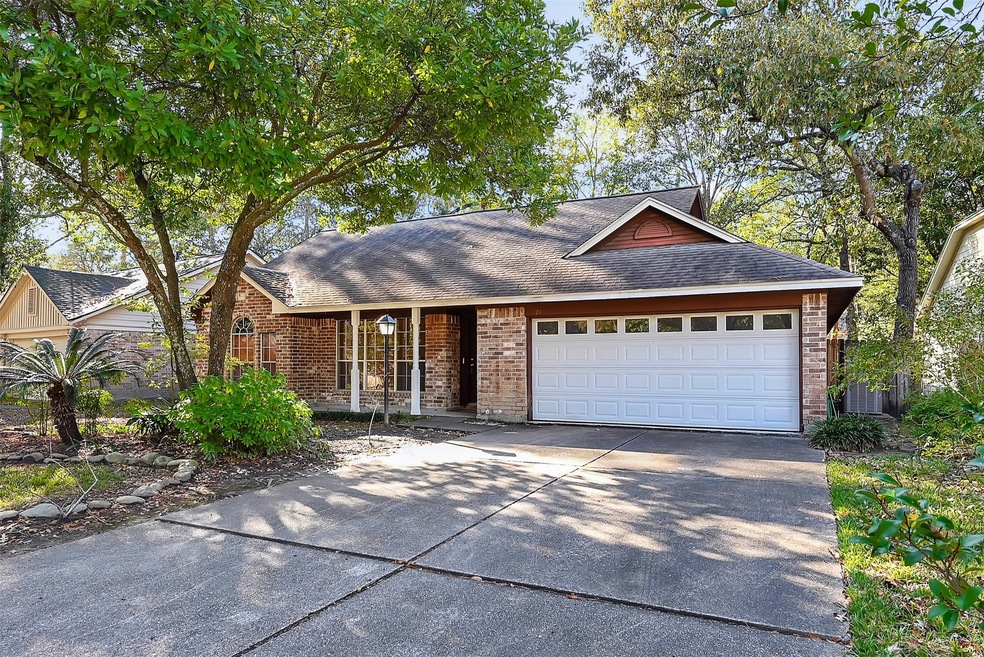 24 S Rain Forest Ct, Spring, TX 77380 - photo 1