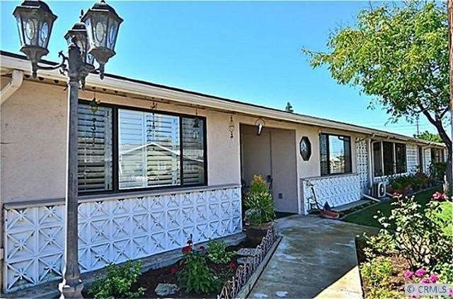 ALMOST FULLY EXPANDED UNIT BOASTS INVITING COVERED