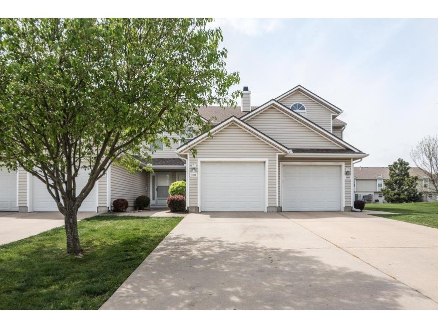 Front of Town Home with Beautiful Tree in Front Ya