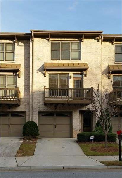 Beautiful brick townhome in established, well-kept