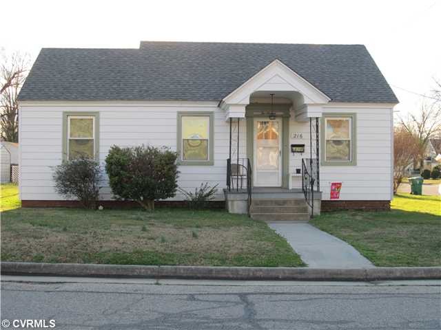 Exterior Front - Newer roof, replacement windows,a