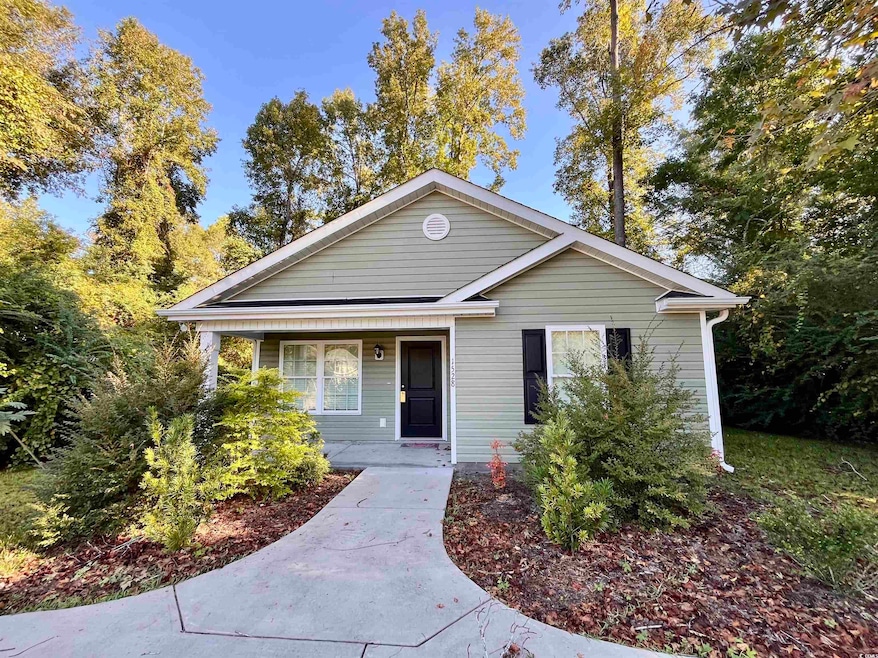View of front of property featuring covered porch