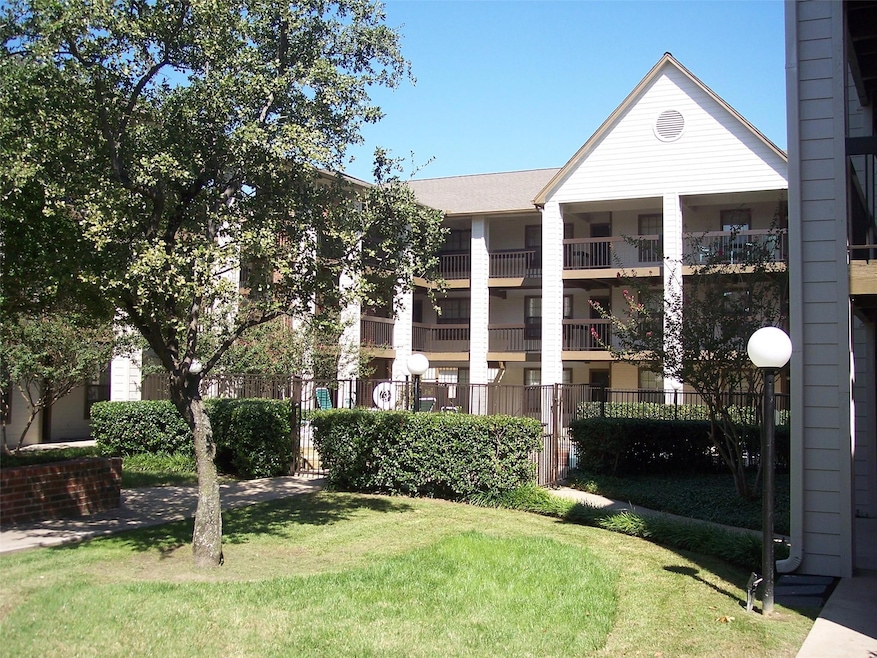 View of front of property featuring a balcony and 