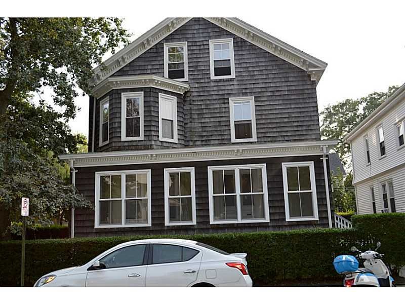 Exterior Front. Pretty Victorian multifamily on Rh