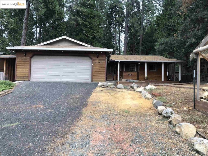Single story home featuring a garage