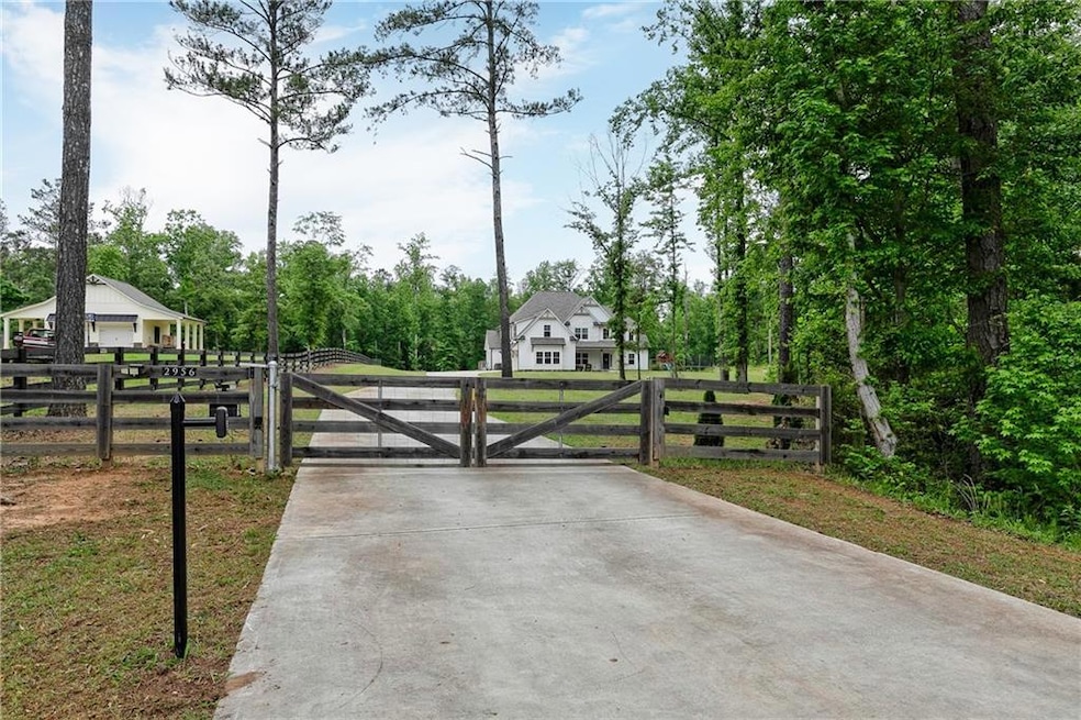 Front view of home and gated entrance.