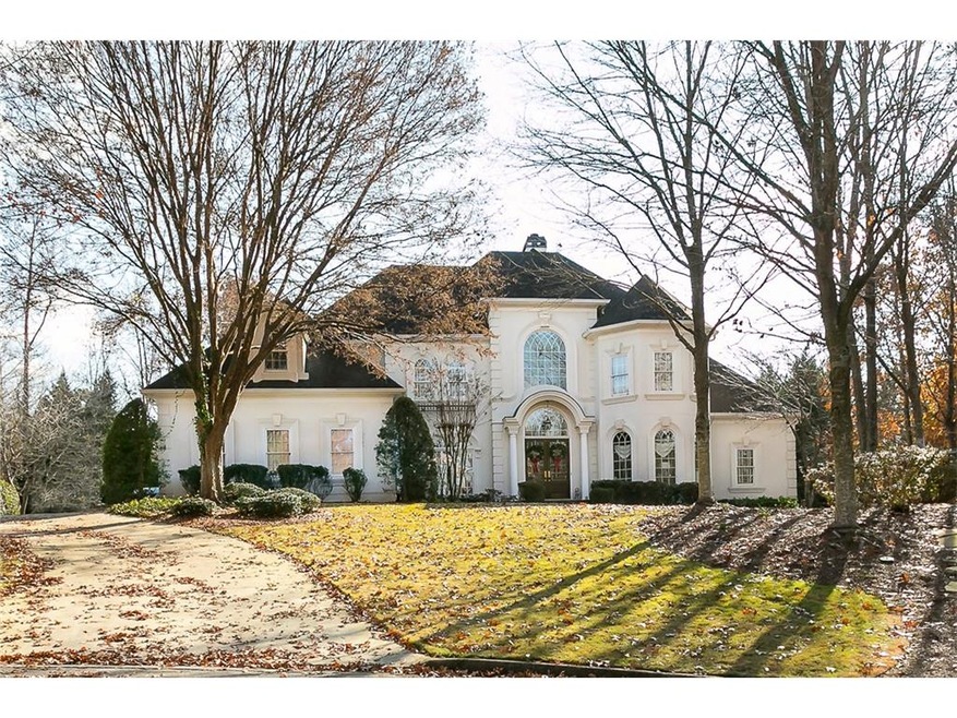 Stately lakefront residence nestled at the end of 