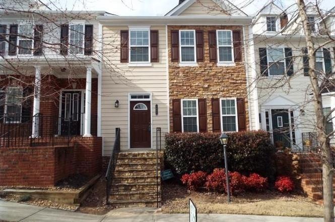 Beautiful townhome with stacked stone accents and 
