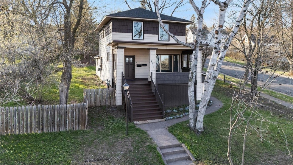 American foursquare style home featuring stairs, f