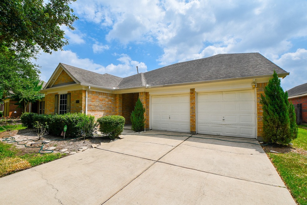 8718 Distant Woods Dr, Houston, TX 77095 - photo 1