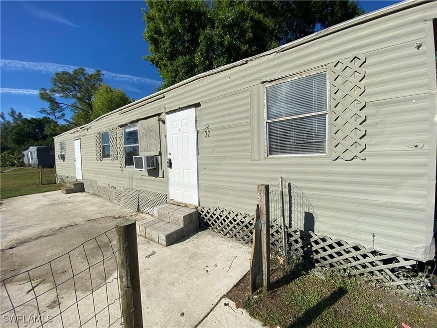 Manufactured / mobile home featuring entry steps, a patio, and cooling unit