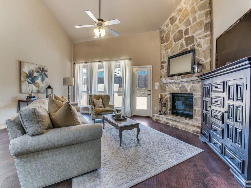 Stunning family room with floor to ceiling firepla