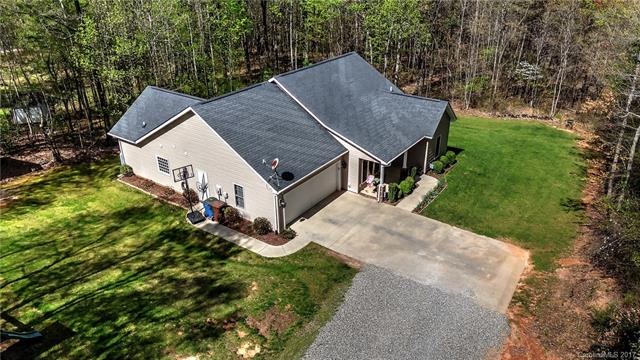 Gorgeous flat, wooded lot has a huge yard. The possibilities are endless