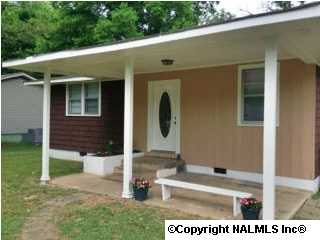 This basic 2 bedroom, 2 bath home is nestled between Monte Sano and Five Points. The covered front porch provides a spot to relax outdoors.