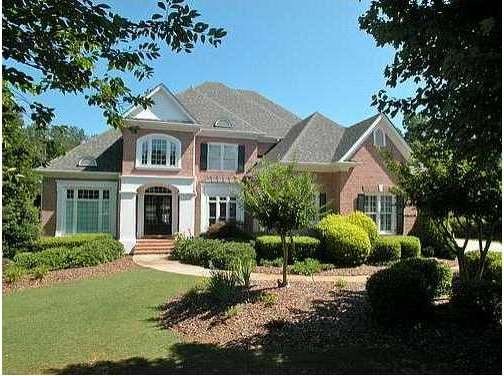 Exterior Front. Lovely four sides brick home on qu
