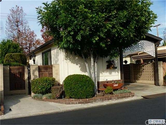 Street view shows gated entrance to private patio.