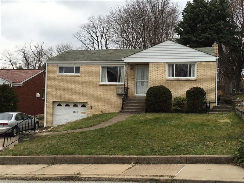 Awesome brick ranch with double wide driveway!