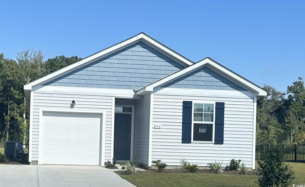 View of front of property with central AC unit and