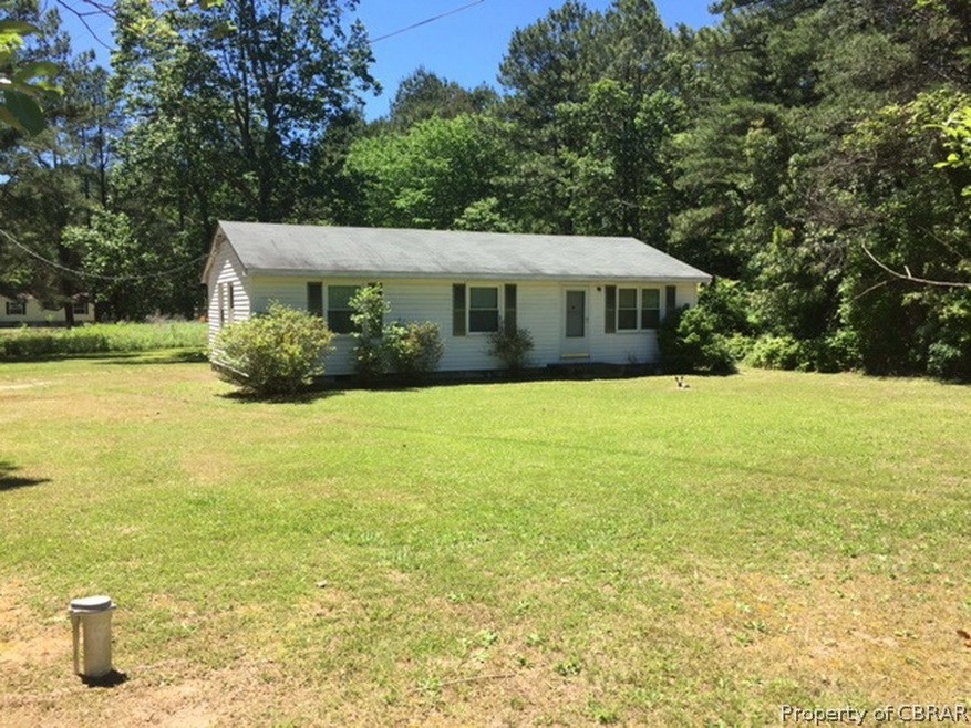 3 bedroom, 1 1/2 bath ranch home on +1 acre.