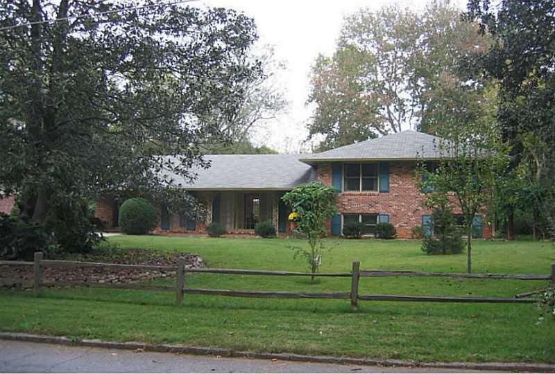 Exterior Front. Solid 4 Sides Brick on large level