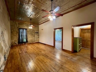 Spacious living room with original hardwood floors