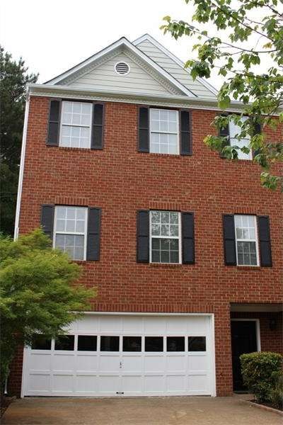 End Unit, Brick Front Town Home  with Wide Drivewa