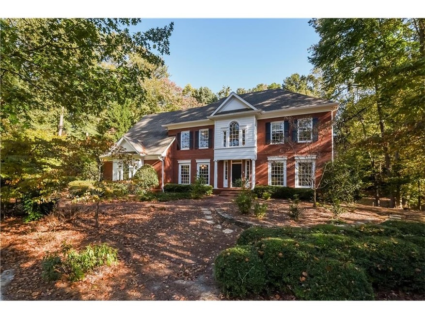 FRONT OF HOUSE WITH LARGE FRONT YARD
