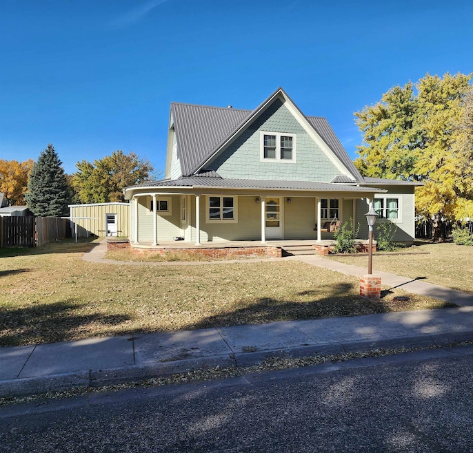 309 Grant St, Quinter, KS 67752 - photo 1