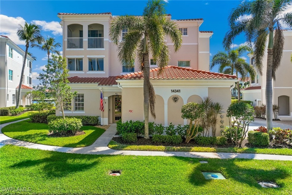 View of front facade with a front yard, a tile roo