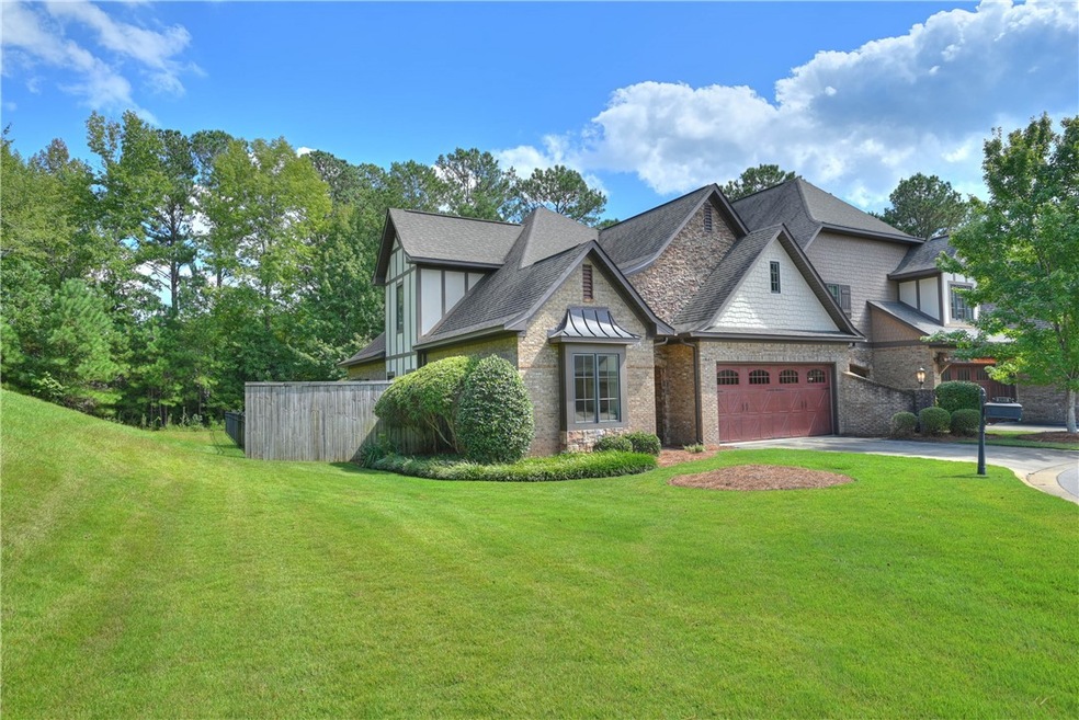 End unit bordering East Lake greenspace