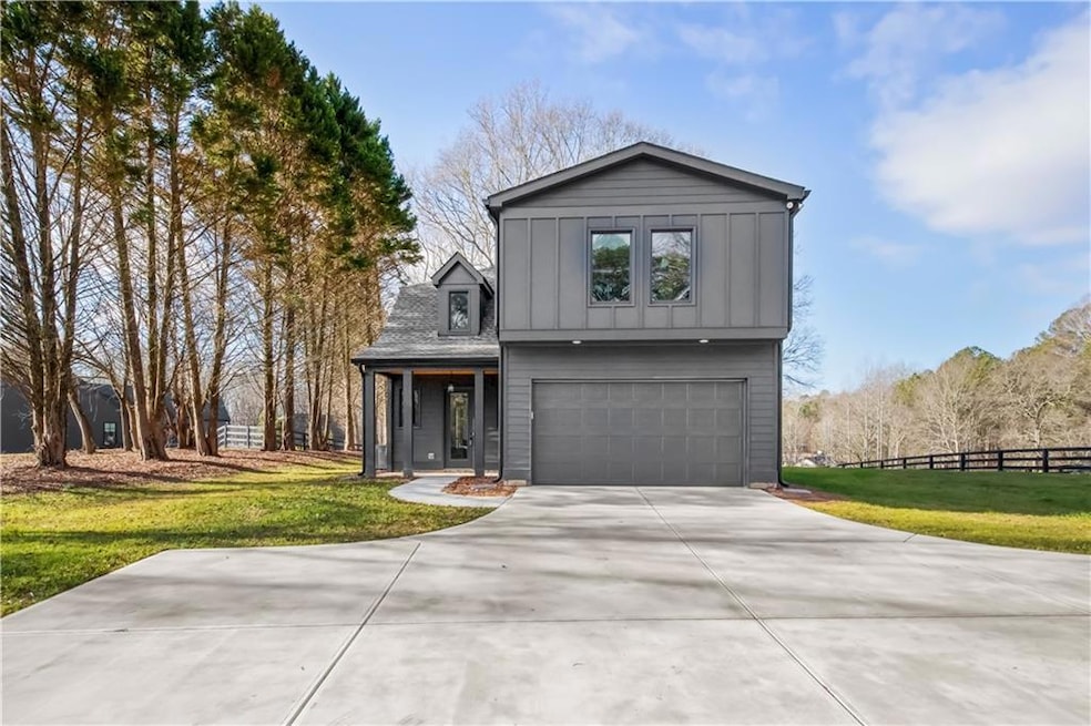 View of front of home with a two-car garage and a 